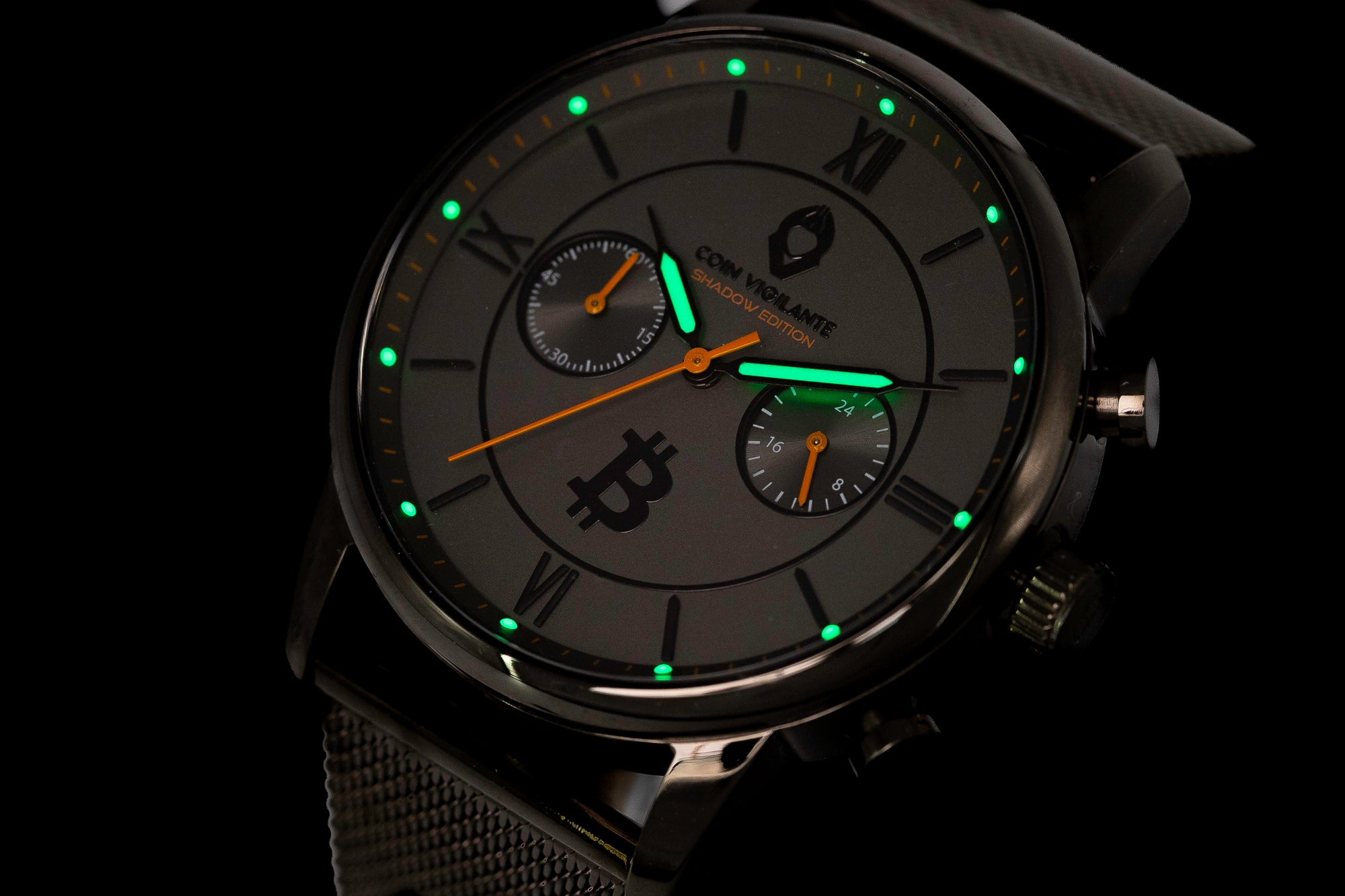 The Coin Vigilante Shadow Edition Bitcoin Watch shown in a dark, elegant setting