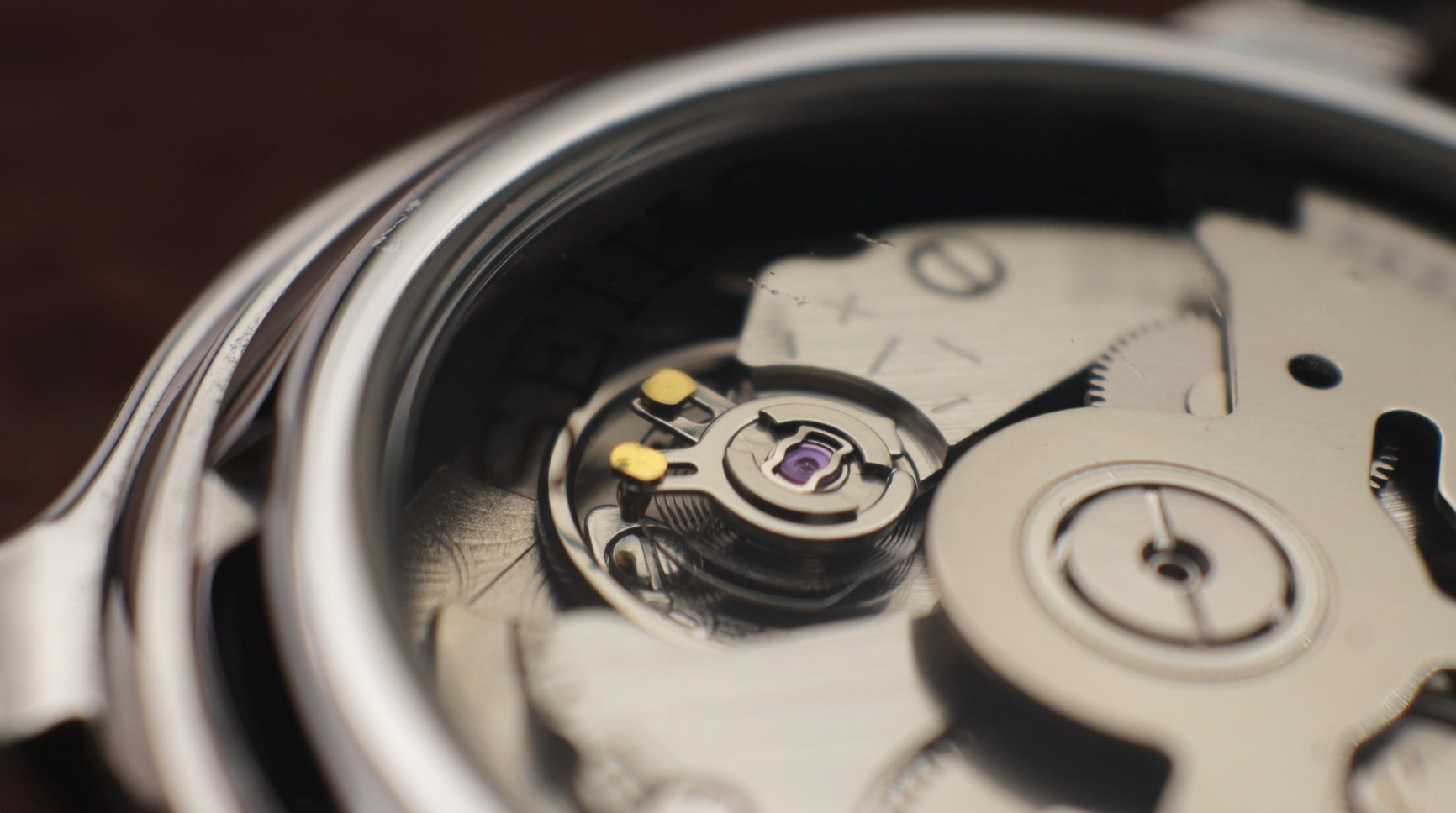 The inside of a Japanese movement watch - Coin Vigilante